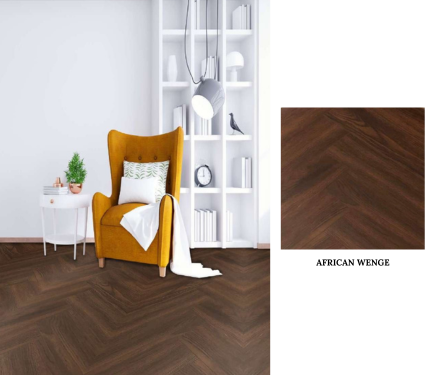 A yellow chair on laminate herringbone wood flooring, showcasing a stylish and modern interior design